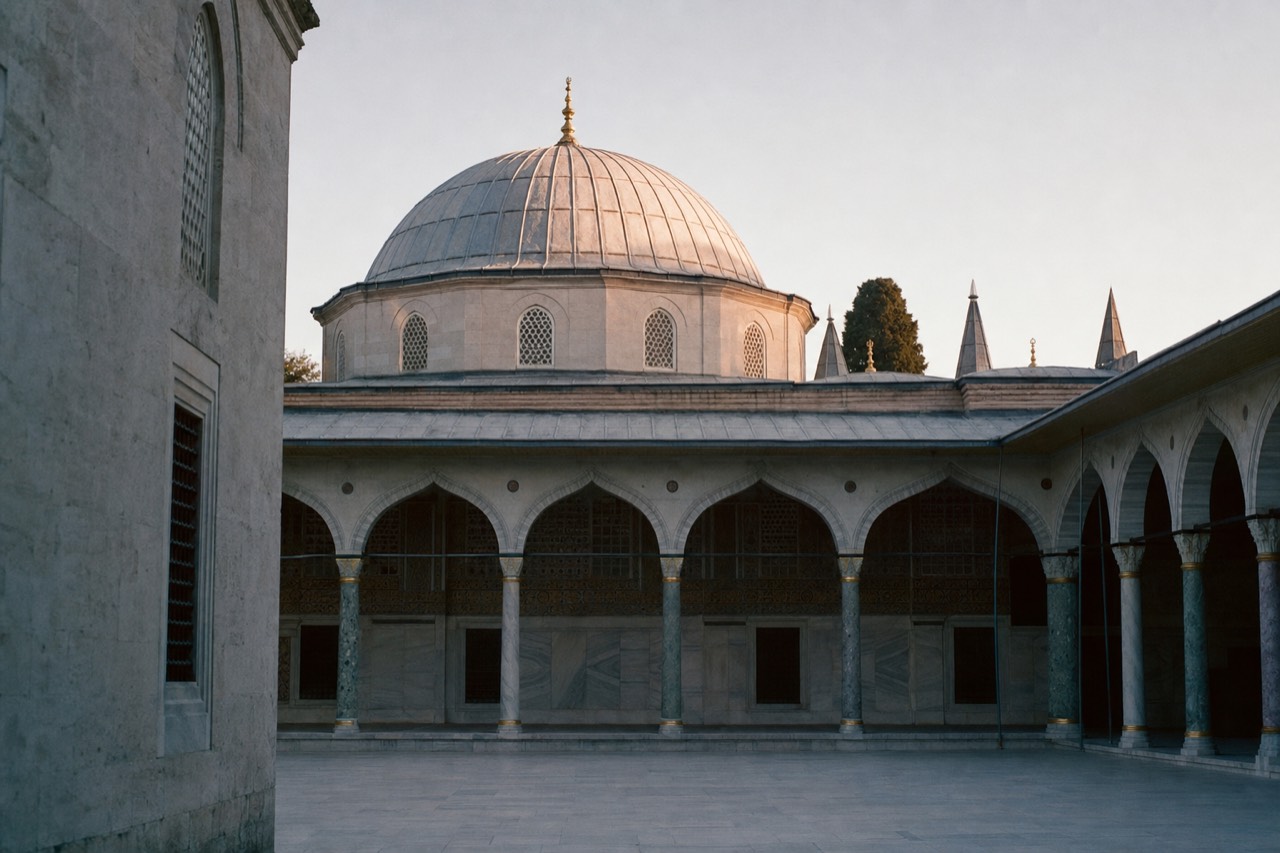 The domed Privy Chamber and its arcaded portico in the third courtyard of Topkapi Palace in quiet morning light